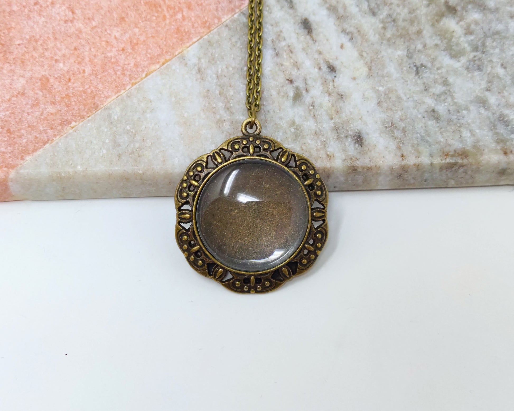 Use our DIY jewelry making supplies and create Handmade Cabochon Jewelry or gift for her with our Antique Bronze Color 25mm cabochon pendant Setting. Put your favorite photos, cabochons, gemstone cabochons, resin, image cabochons in to bezel pendant.