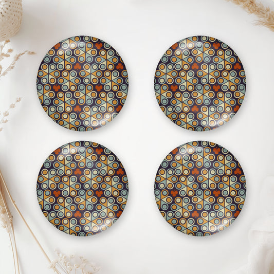 Four round flat back cabochons with a vintage geometric mosaic pattern
